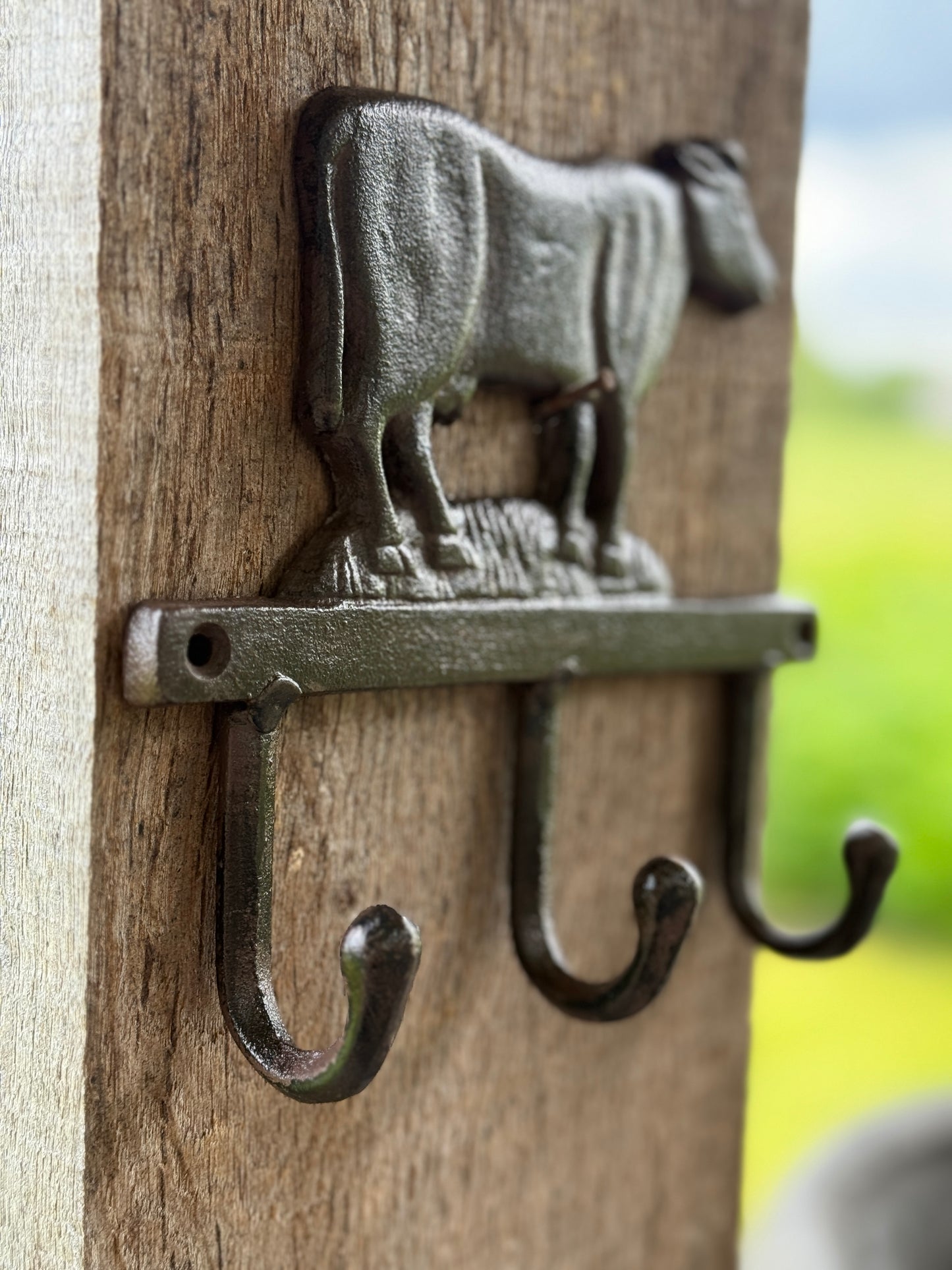 Wrought iron wall rack/coat rack "Cow"