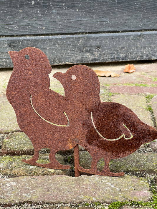 Chicks on pin, rusted