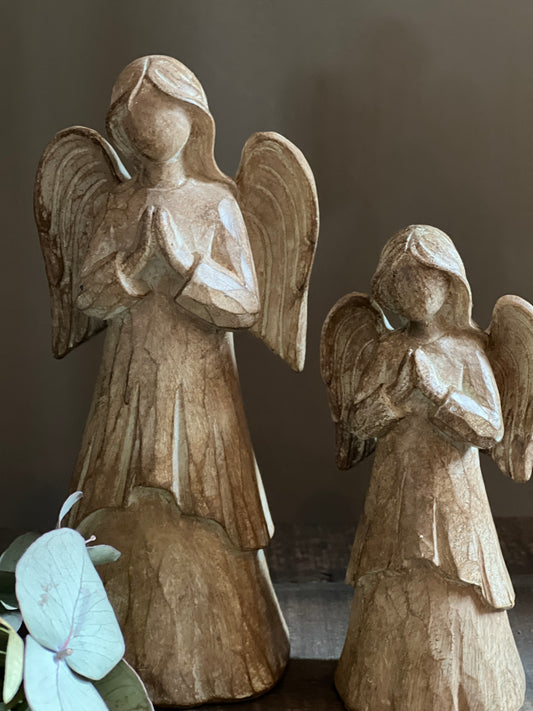 Wooden angel natural, available in M and L
