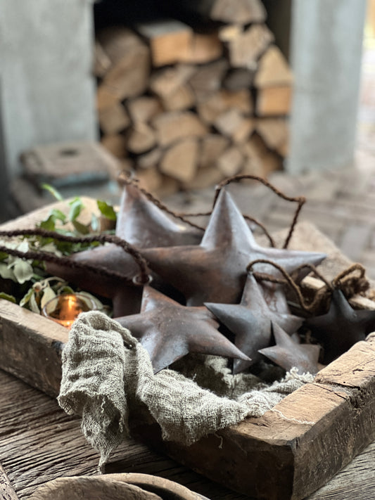 Rusted star on sturdy rope available in various sizes