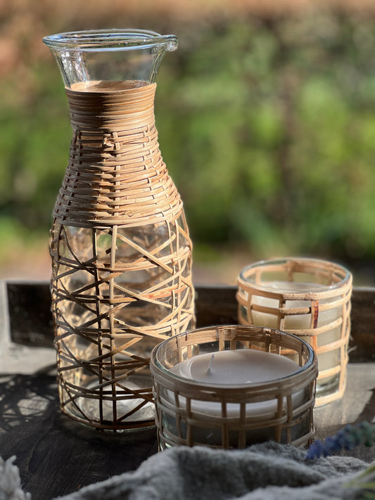 Candle in glass with reed wrapped around it, "Flower", available in 2 sizes