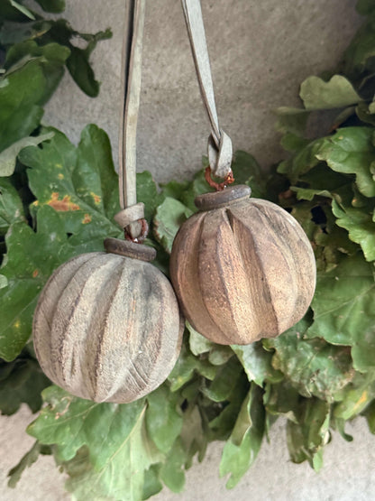 Round Wooden Spool with Wood Carving and Leather Cord