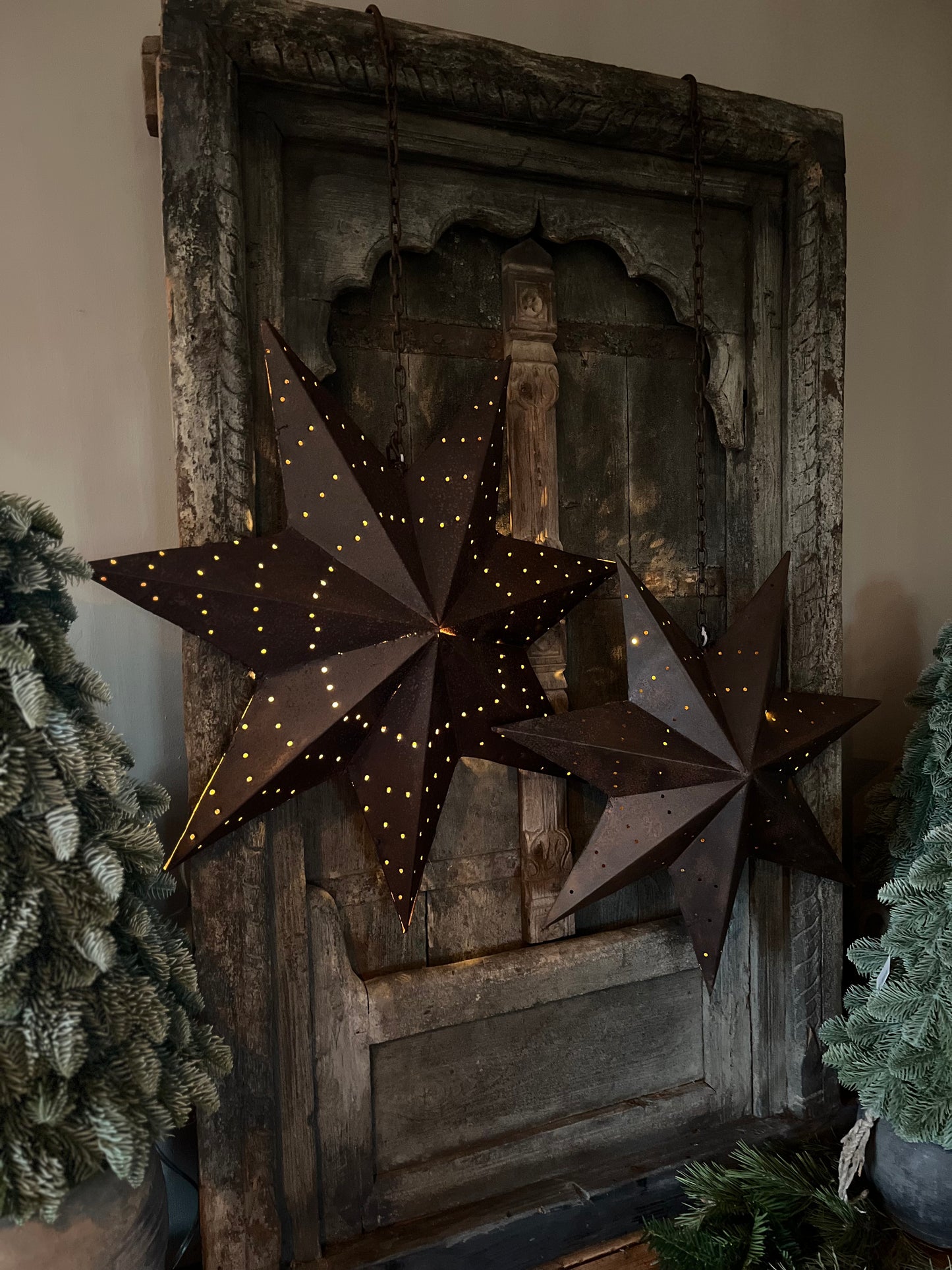 Rusted metal star on sturdy chain available in 4 sizes