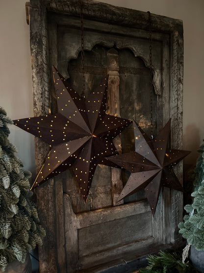 Rusted metal star on sturdy chain available in 4 sizes