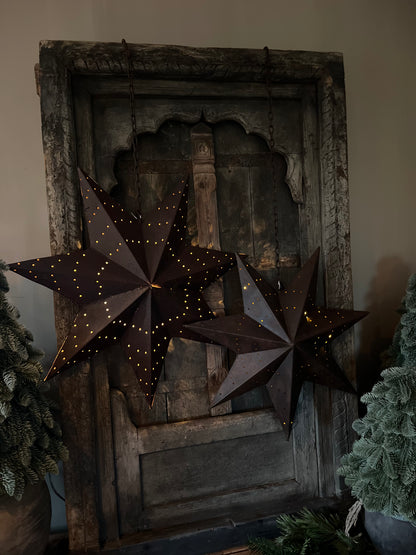 Rusted metal star on sturdy chain available in 4 sizes