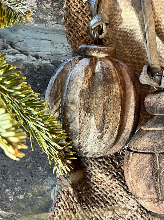 Round Wooden Spool with Wood Carving and Leather Cord