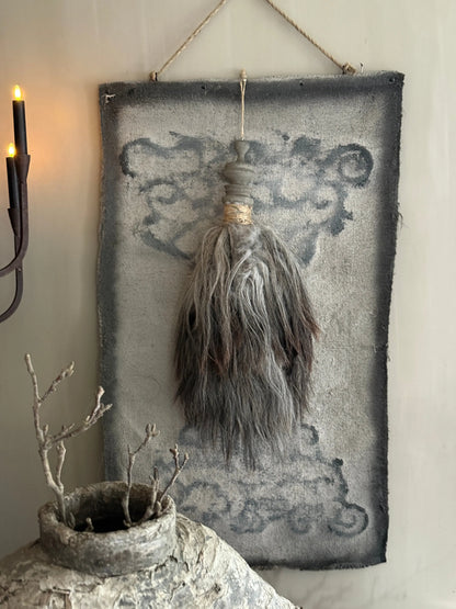 Lime cloth with ornament and sheepskin tuft (LHT01)