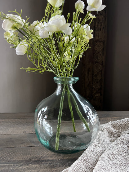 Clear glass vase with narrow opening