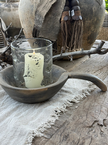Weathered wooden bowl with a handle. (LH002)