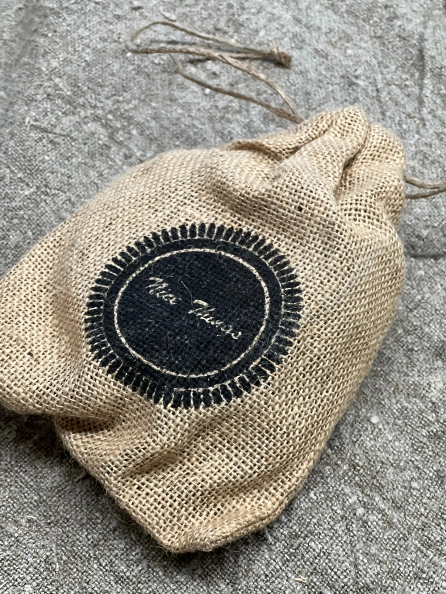 Onderzetters  hout in jute zakje