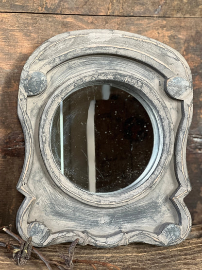 Ox eye mirror