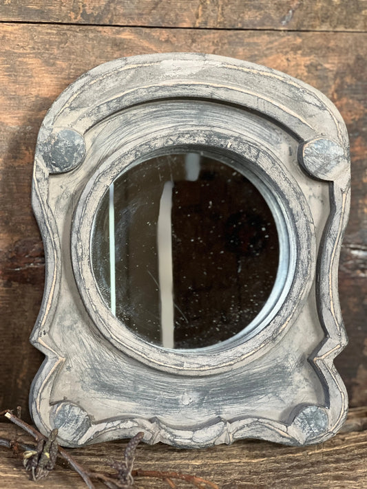 Ox eye mirror