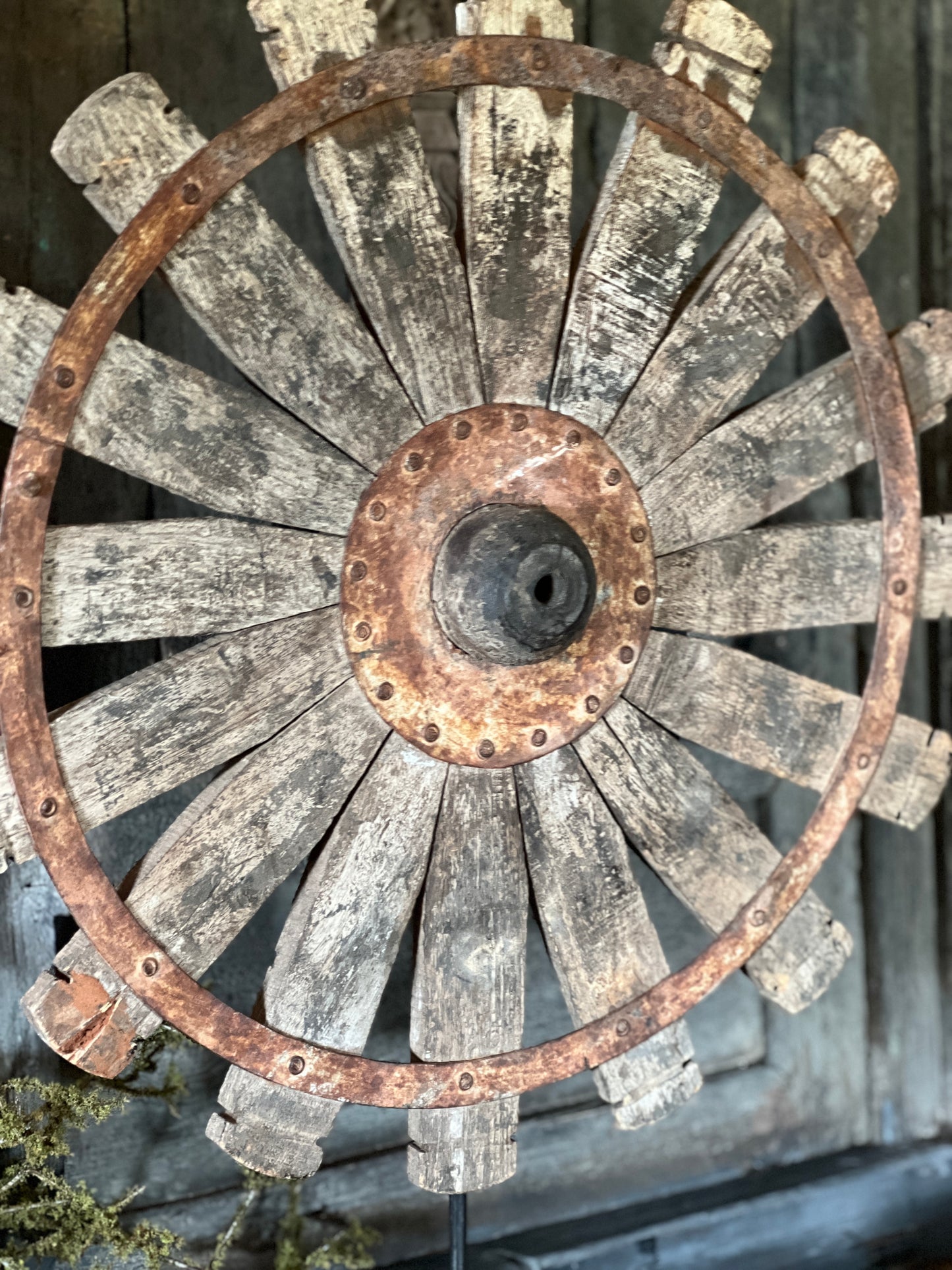 Spinning wheel on tripod.