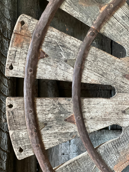 Spinning wheel on tripod.