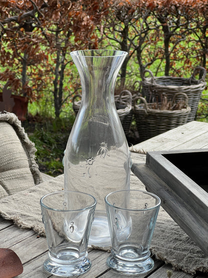 Glass carafe with dragonfly