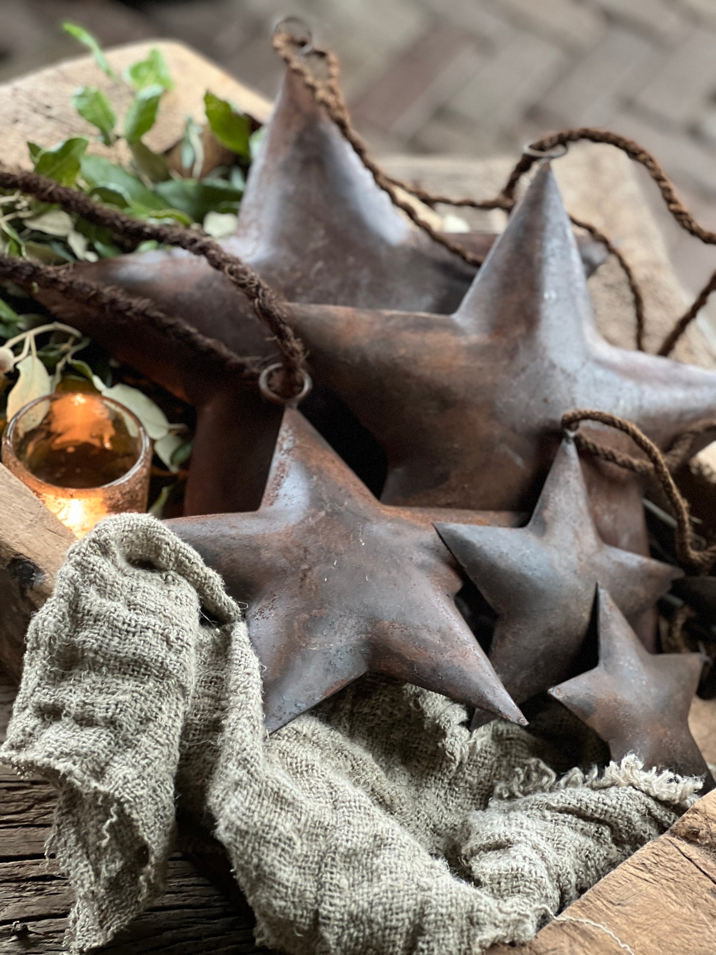 Rusted star with ribbon, available in various sizes