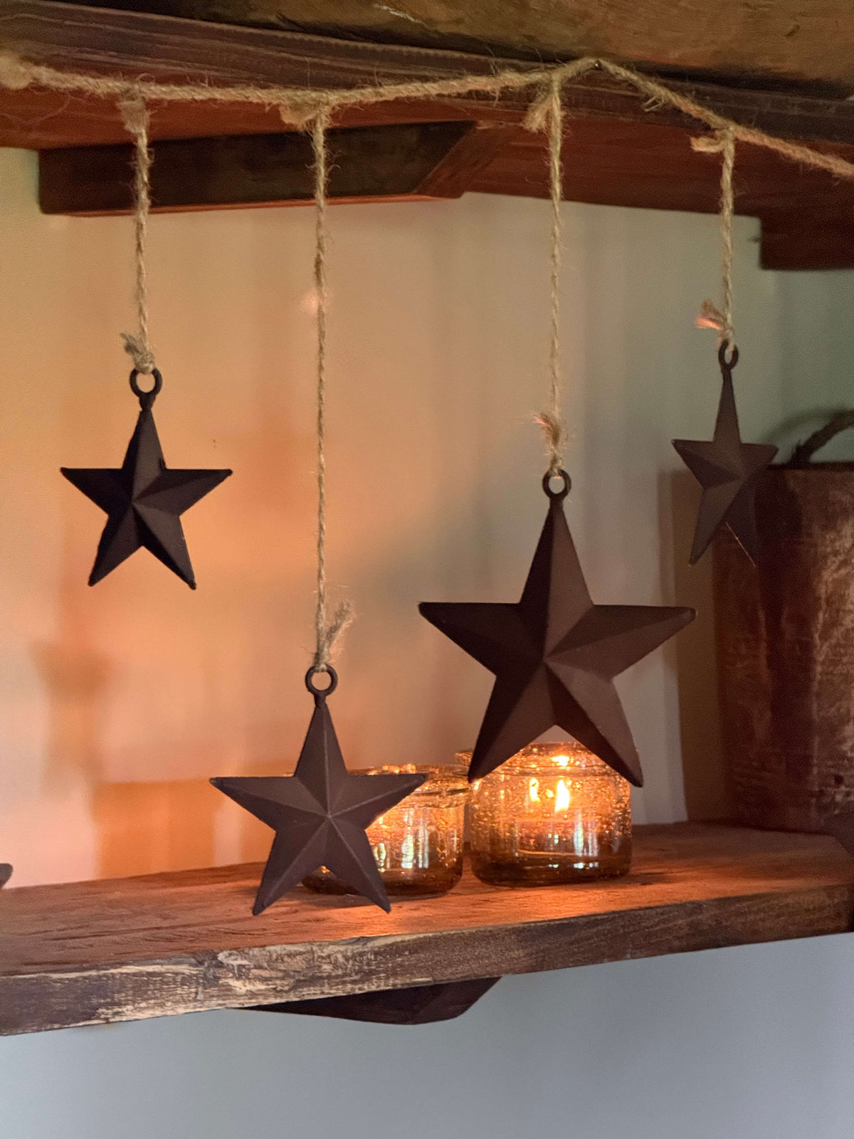 Kerstslinger met roestkleurige sterren- 150 cm.