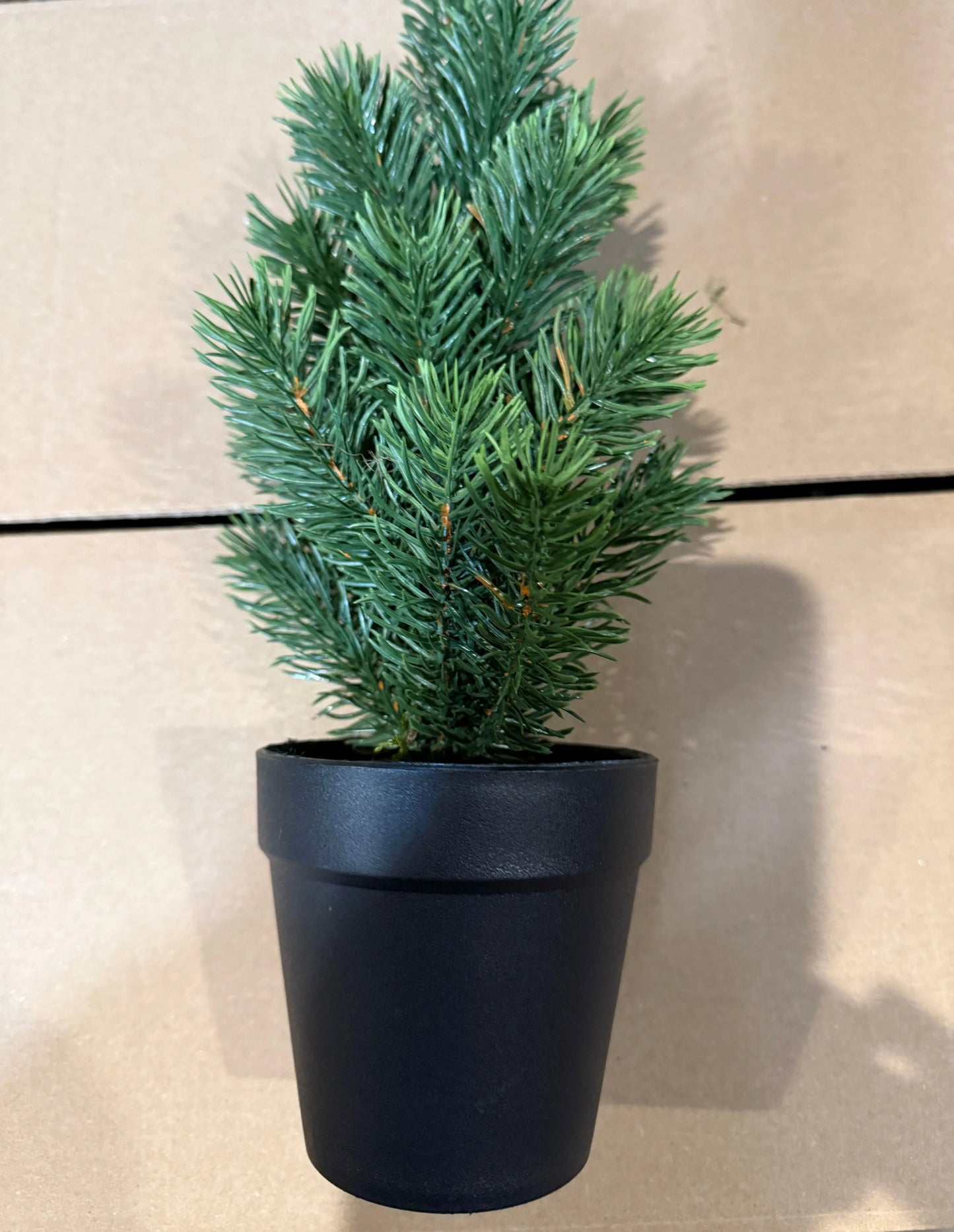 Artificial Christmas tree in plastic pot available in 2 sizes