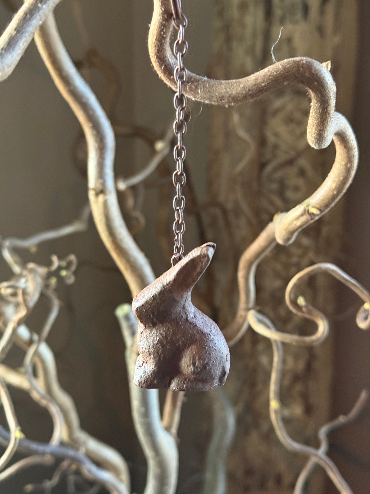 Metal hare on iron chain – rust color