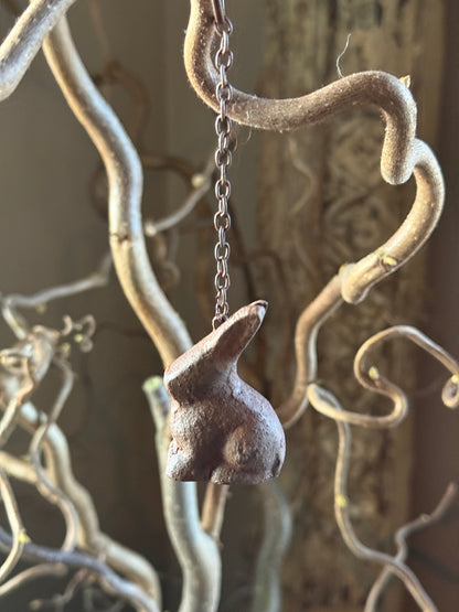 Metal hare on iron chain – rust color