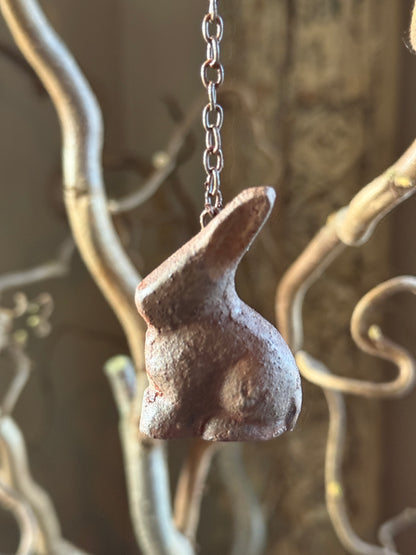 Metal hare on iron chain – rust color