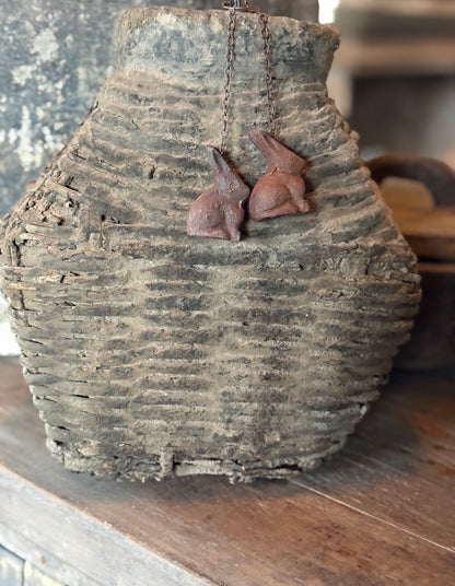 Metal hare on iron chain – rust color