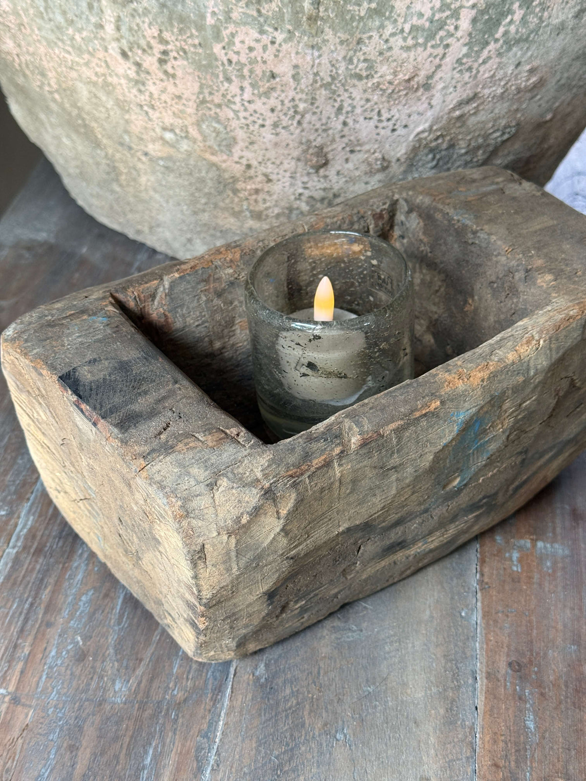 Oude houten vijzel uit India
