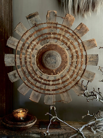 Wooden wheel on metal base