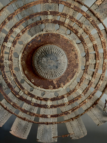 Wooden wheel on metal base