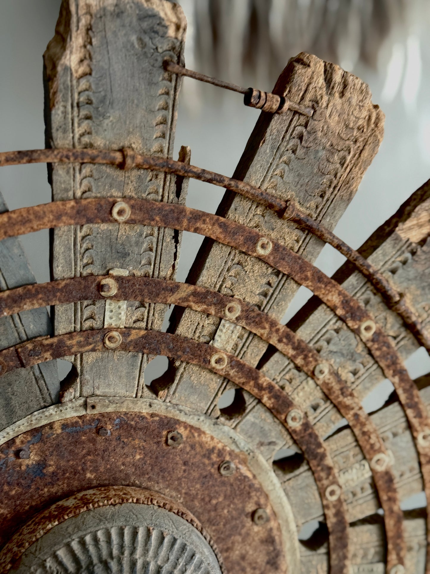 Wooden wheel on metal base