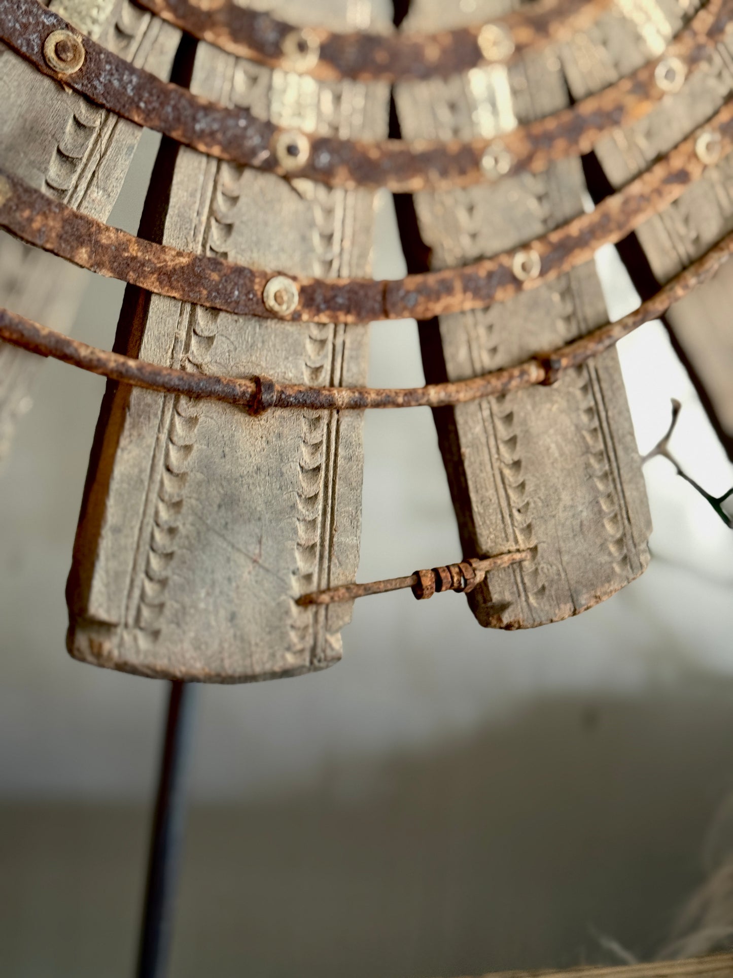 Wooden wheel on metal base