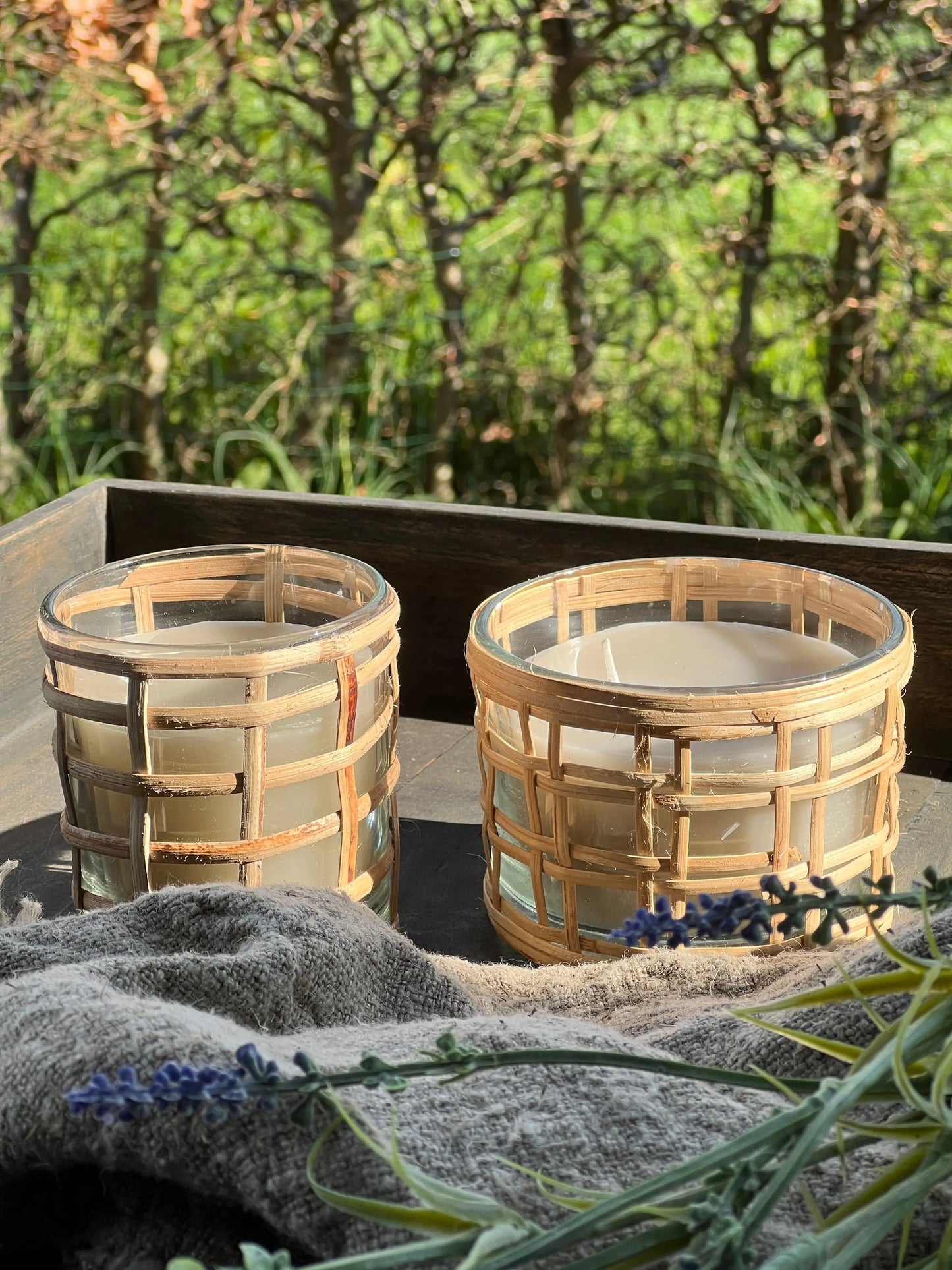 Candle in glass with reed wrapped around it, "Flower", available in 2 sizes