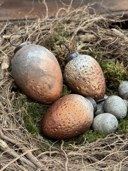 Decorative Easter egg gold/copper 7x5 cm.