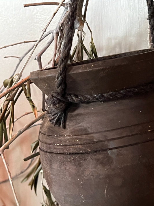 Bol nepalese potjes aan touw