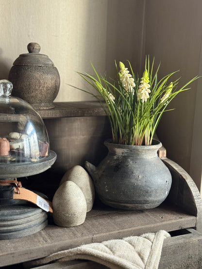 Art jar with white grapes