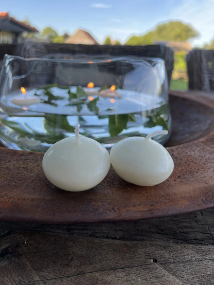 Floating candles (per bag 20 pieces) available in wine red and off-white