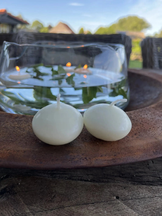 Schwimmkerzen (pro Beutel 20 Stück) erhältlich in Weinrot und Offwhite