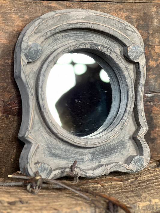 Ox eye mirror