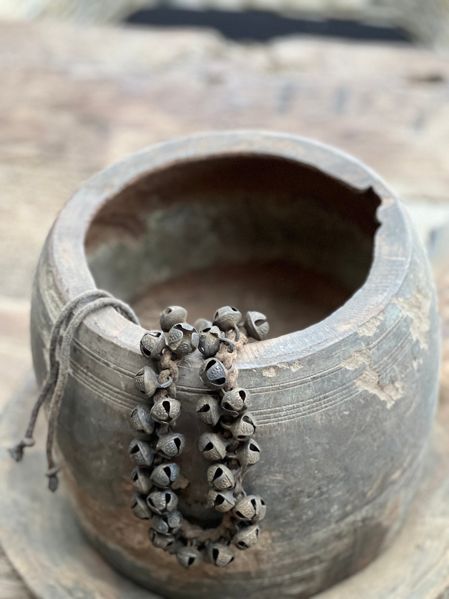 Necklace with metal bells.