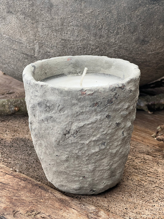 Candle in cement pot